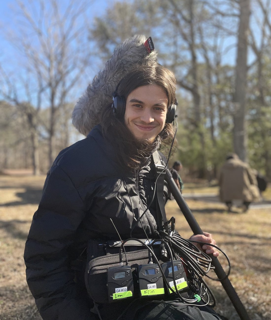 Rufus Phipps-Kaye on location with a full sound bag and boom rig